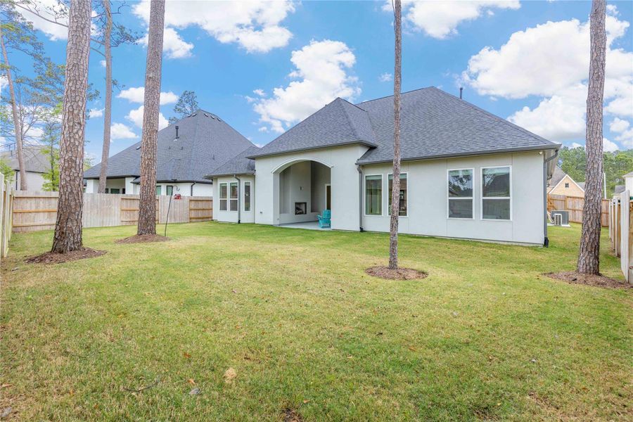 Exterior details and patio area of a home in , Conroe (Image 25). Exterior details and patio area of a home in , Conroe (Image 25).