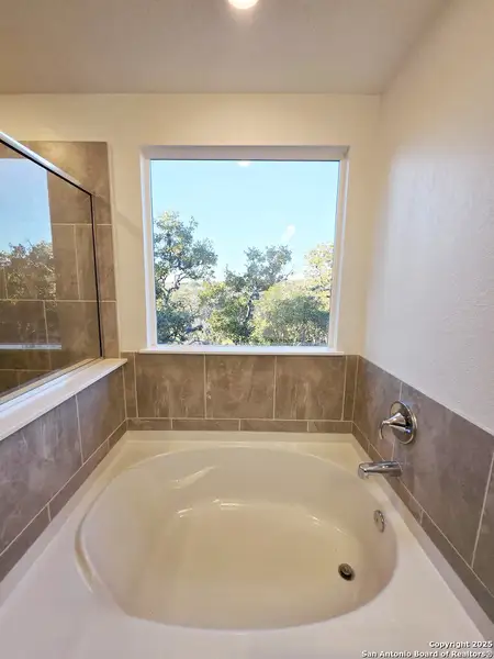 Furnished interior view inside a new home in Cove at Westover Hills, San Antonio (Image 5).
