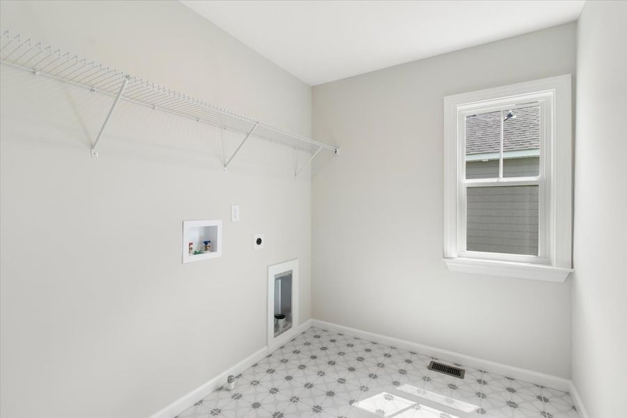 Laundry Room | 6244 Canterbury Farms Pkwy in Tillery Park