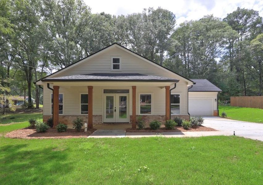 Front exterior of a new home in , Monroe, GA, highlighting curb appeal (Image 18).