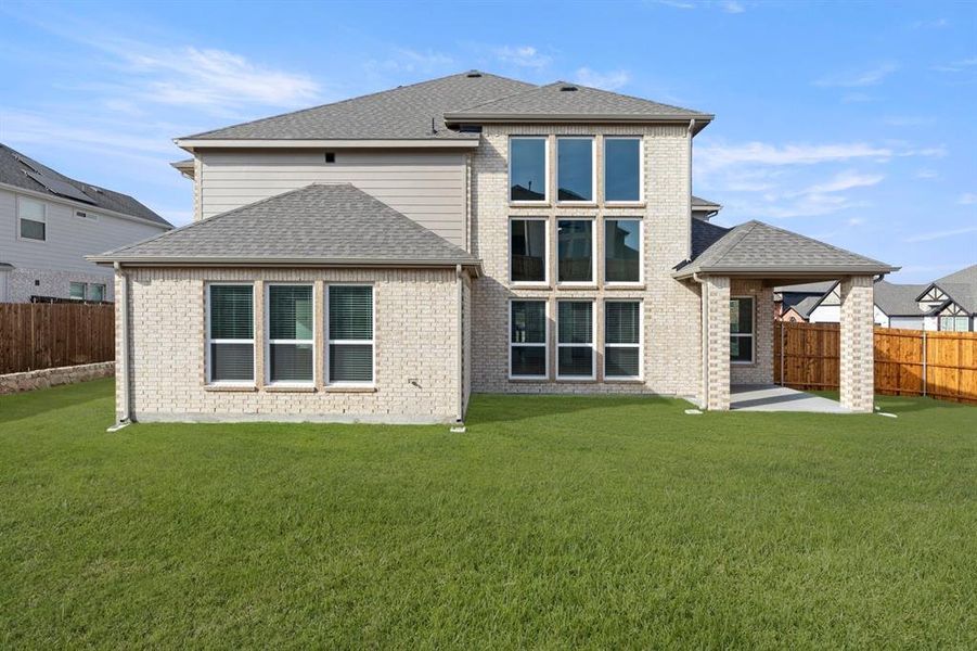 Exterior details and patio area of a home in Woodcreek, Fate (Image 3).