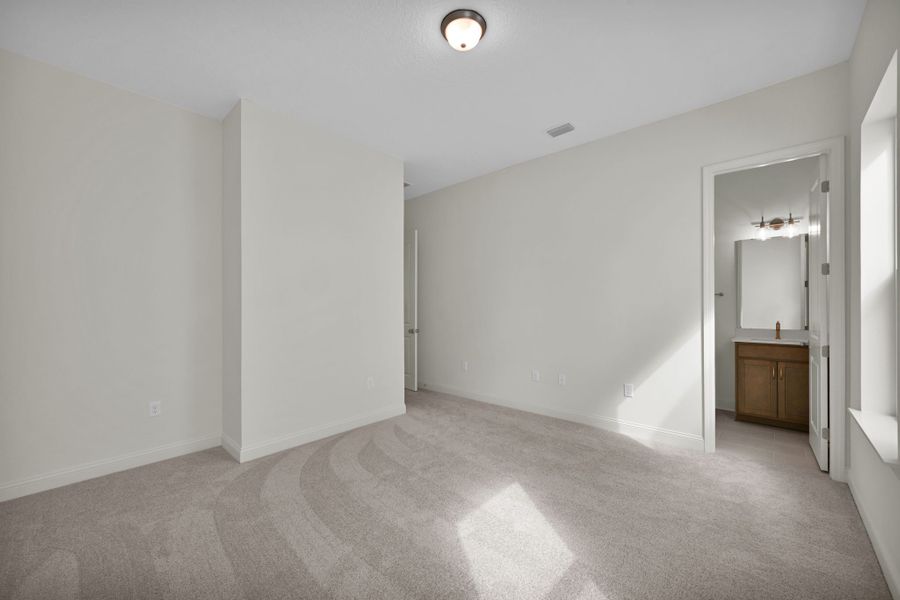 Representative unfurnished interior of a home built from the Hudson II by Riverside Homes in Hidden Creek at SilverLeaf 70' Series, St. Augustine (Image 19).