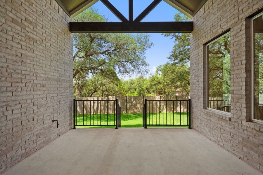 Exterior details and patio area of a home in Wolf Ranch, Georgetown (Image 28).