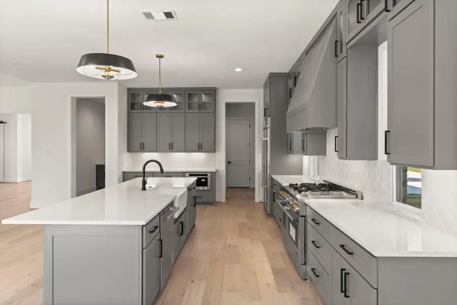 Furnished interior view inside a new home in Homestead Hill, New Waverly (Image 4).