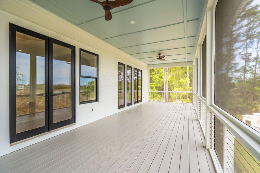 Exterior details and patio area of a home in , Johns Island (Image 40).