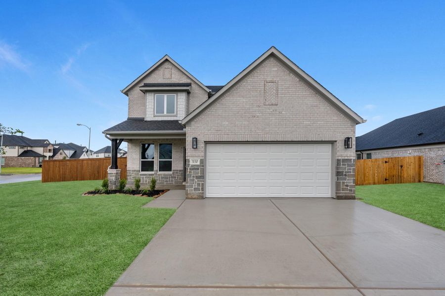 Front exterior of a new home in Briarwood Crossing, Rosenberg, TX, highlighting curb appeal (Image 2). Front exterior of a new home in Briarwood Crossing, Rosenberg, TX, highlighting curb appeal (Image 2).