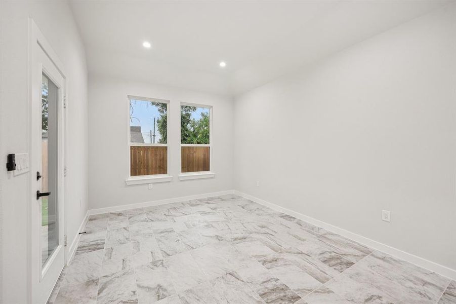 Empty room with recessed lighting and light marble finish floors Empty room with recessed lighting and light marble finish floors