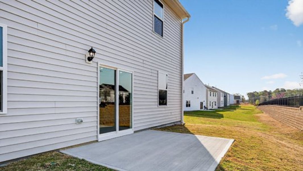 Exterior details and patio area of a home in The Reserve at Prestleigh, Wake Forest (Image 3).