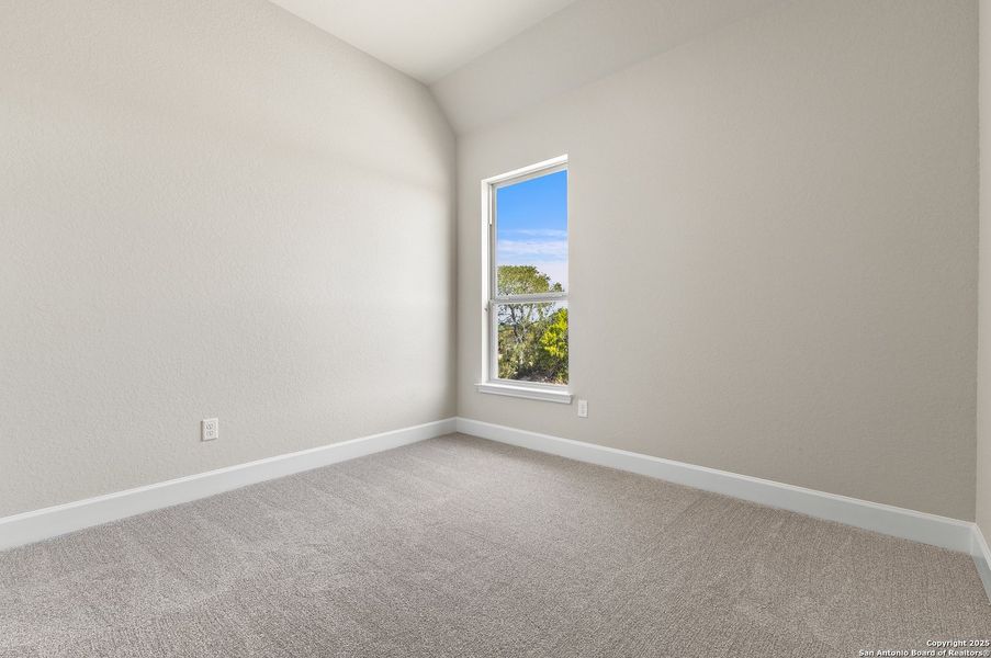 Spacious, unfurnished interior of a new home in The Enclave at Potranco Oaks, Castroville (Image 19).