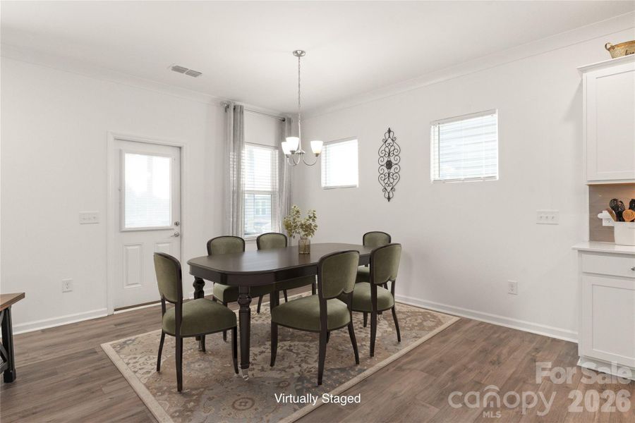 This dining area just off the kitchen has room for all