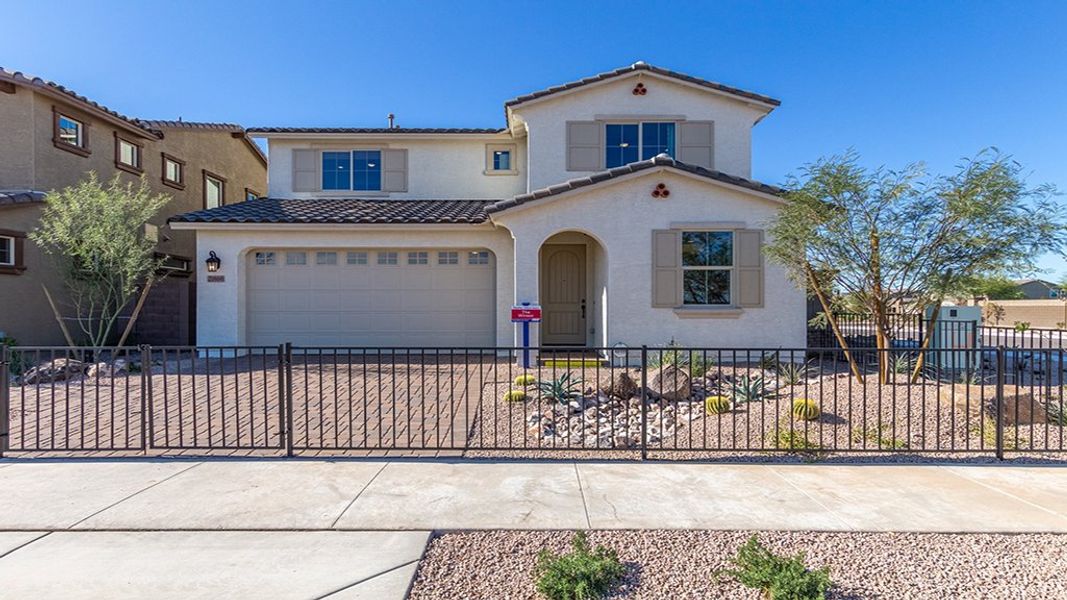 Representative exterior photo of a completed home built from the Winsor by Taylor Morrison in Paradisi Discovery Collection, Surprise, AZ (Image 20).