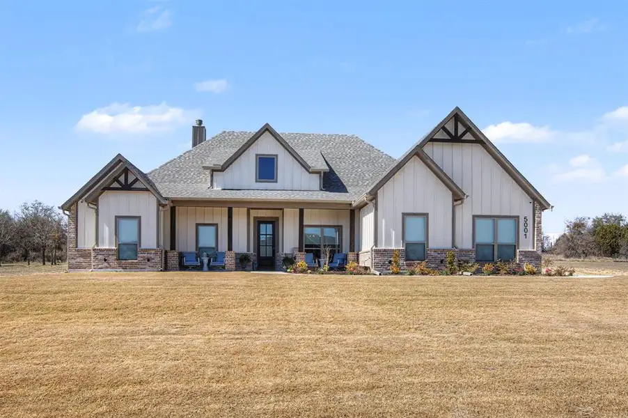 Front exterior of a new home in Kessler Farms, Brock, TX, highlighting curb appeal (Image 21).