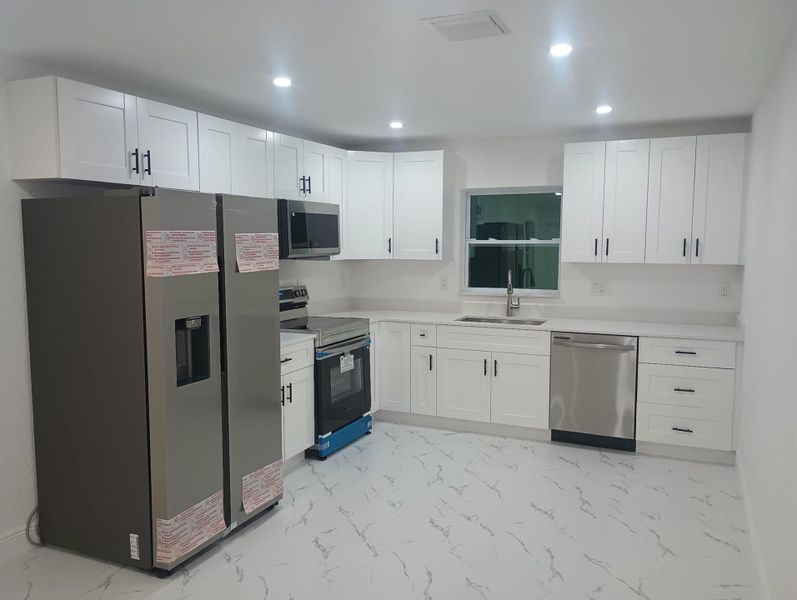 Furnished interior view inside a new home in , Indiantown (Image 4).