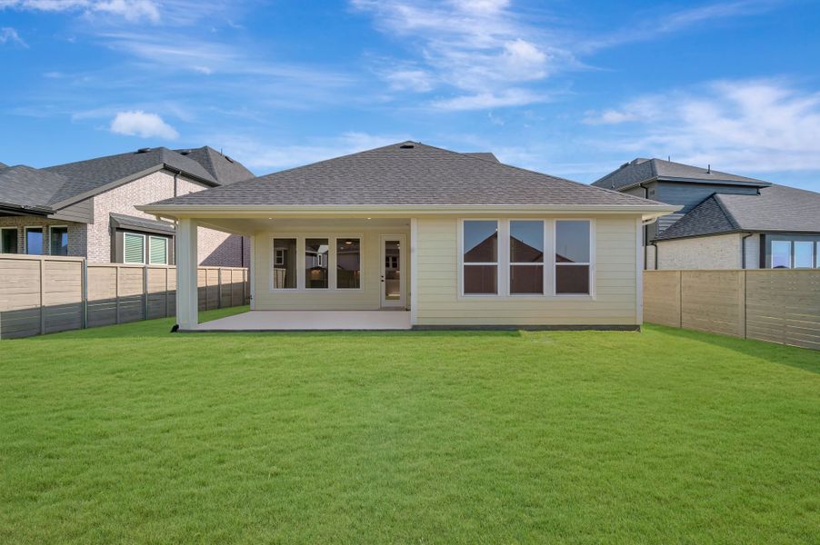 Exterior details and patio area of a home in Treeline, Justin (Image 19).