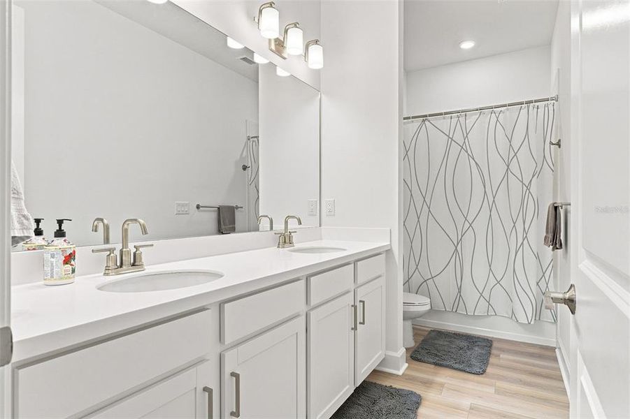 Furnished interior view inside a new home in Esplanade at Azario Lakewood Ranch, Bradenton (Image 22). Furnished interior view inside a new home in Esplanade at Azario Lakewood Ranch, Bradenton (Image 22).