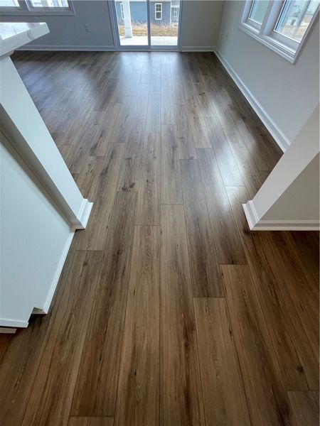 This interior hallway features sleek flooring and