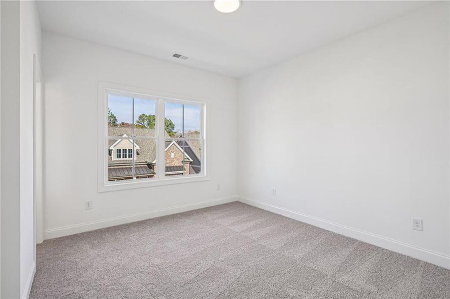 Spacious, unfurnished interior of a new home in Evanshire Townhomes, Duluth (Image 32).