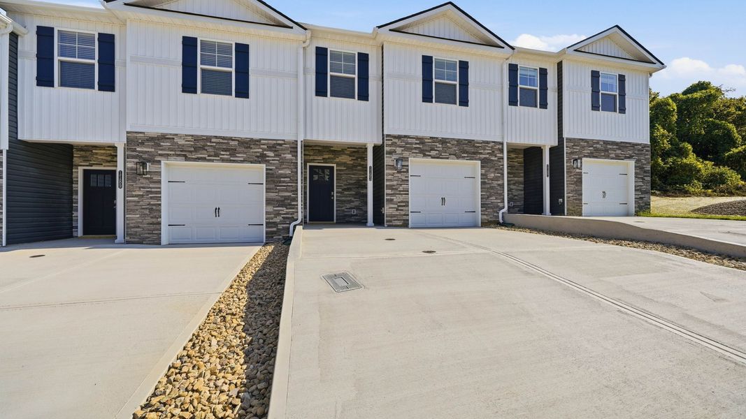 Front exterior of a new home in The Arbor Townhomes, Kingsport, TN, highlighting curb appeal (Image 14).