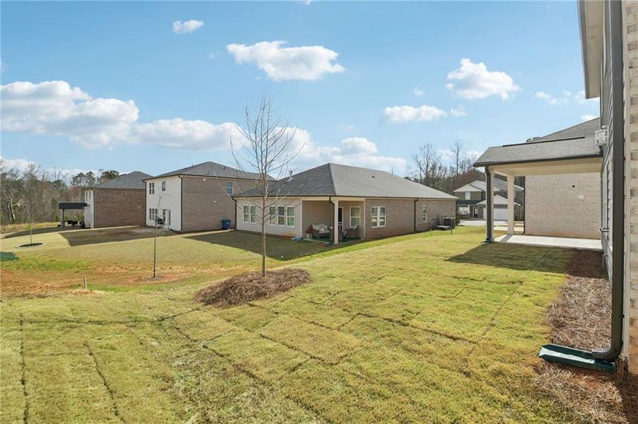 Exterior details and patio area of a home in Creekside at Oxford Park, Fairburn (Image 4).