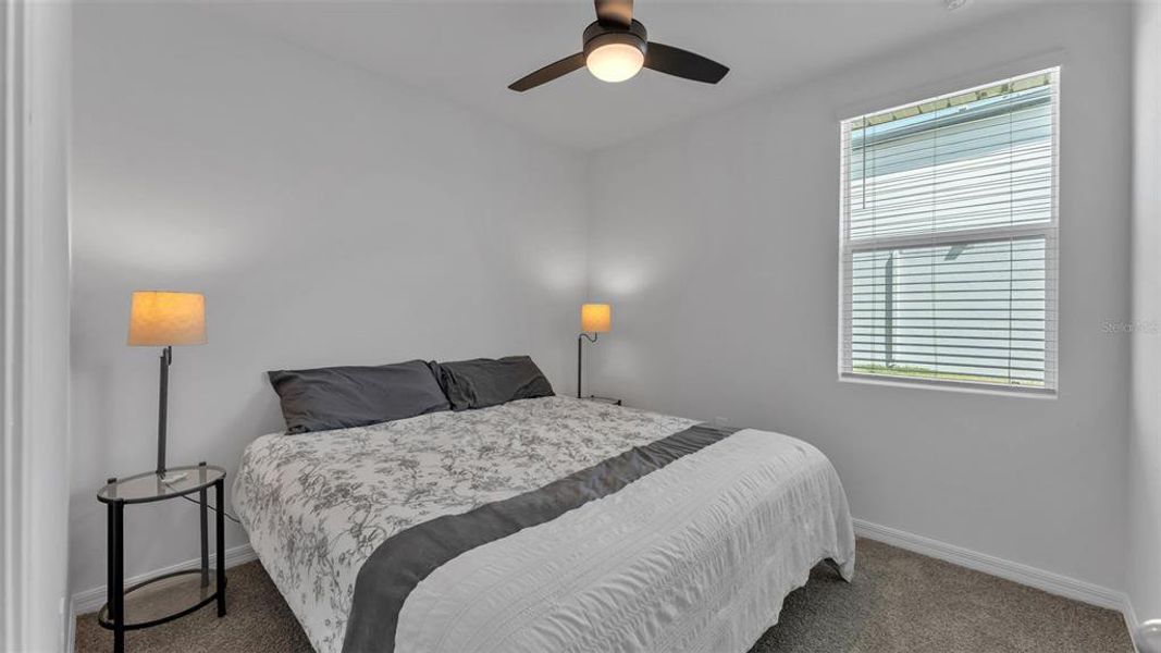 Furnished interior view inside a new home in The Grove at Stuart Crossing - Premier Series, Bartow (Image 10).