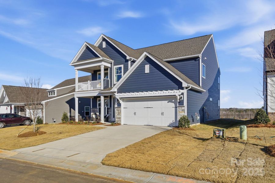 Front exterior of a new home in The Meadows at Laurelbrook, Sherrills Ford, NC, highlighting curb appeal (Image 1).