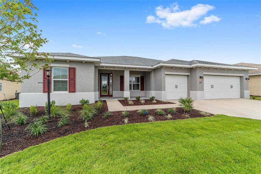 Front exterior of a new home in On Top of the World Communities, Ocala, FL, highlighting curb appeal (Image 1). Front exterior of a new home in On Top of the World Communities, Ocala, FL, highlighting curb appeal (Image 1).