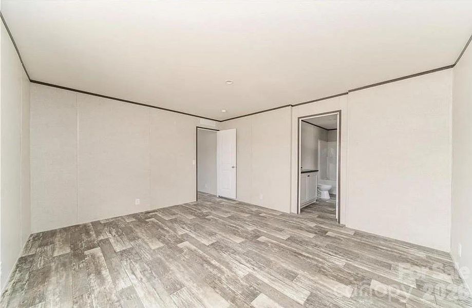 Spacious, unfurnished interior of a new home in , Lenoir (Image 10).