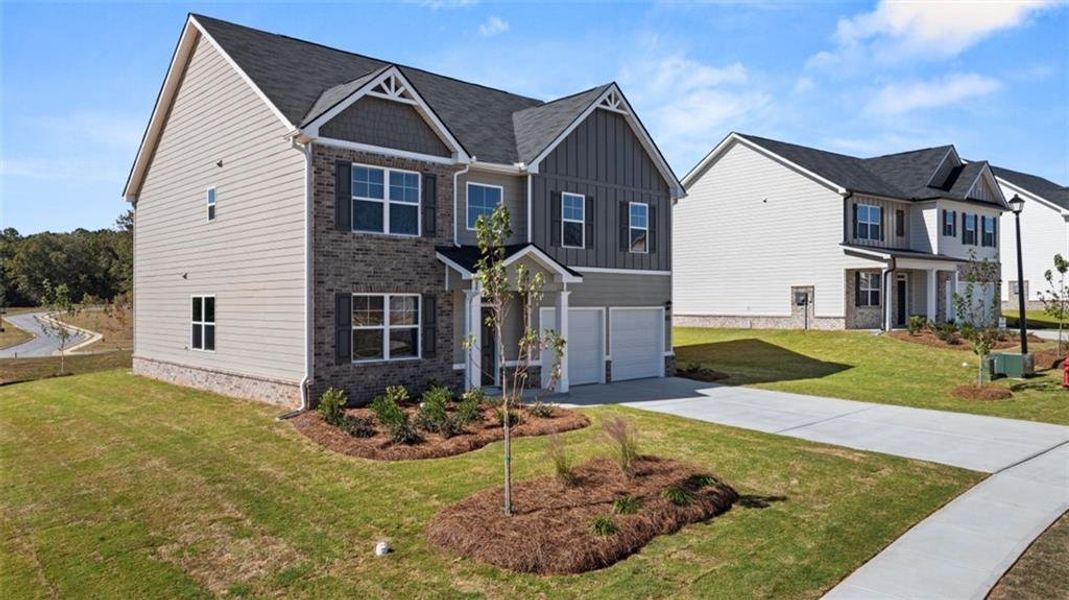Front exterior of a new home in Cedar Ridge - Locust Grove Station, Locust Grove, GA, highlighting curb appeal (Image 19).