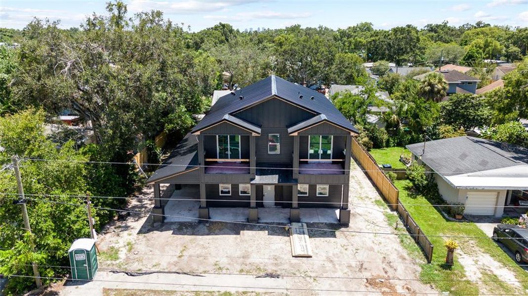 Front exterior of a new home in , Tampa, FL, highlighting curb appeal (Image 18).