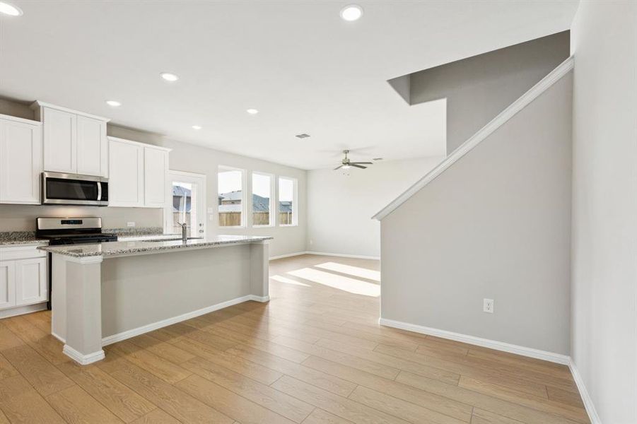 Furnished interior view inside a new home in AnaCapri, Anna (Image 8).