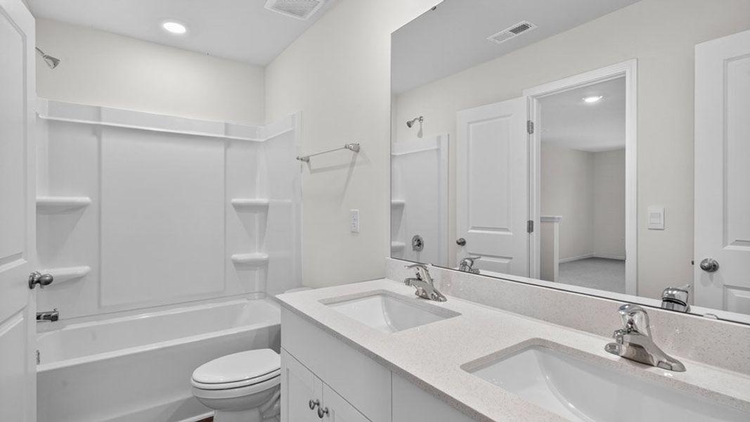 Furnished interior view inside a new home in Olive Branch, Clayton (Image 8). Furnished interior view inside a new home in Olive Branch, Clayton (Image 8).