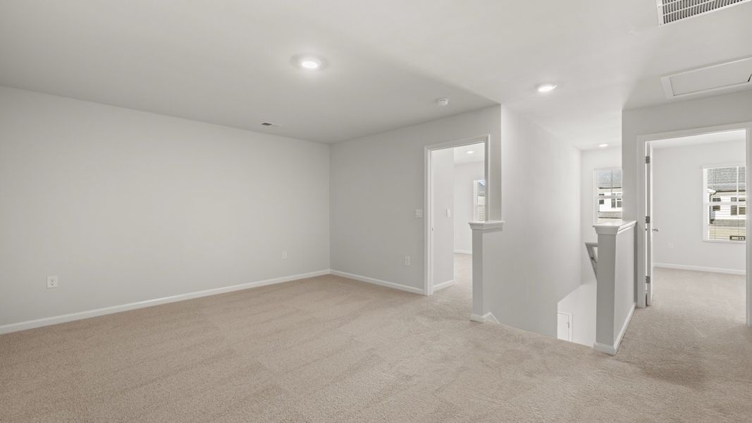 Spacious, unfurnished interior of a new home in Byrd Village, Graniteville (Image 22).