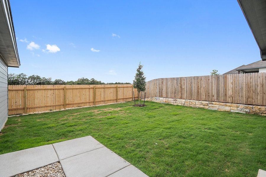 Exterior details and patio area of a home in Sage Hollow, Kyle (Image 3). Exterior details and patio area of a home in Sage Hollow, Kyle (Image 3).
