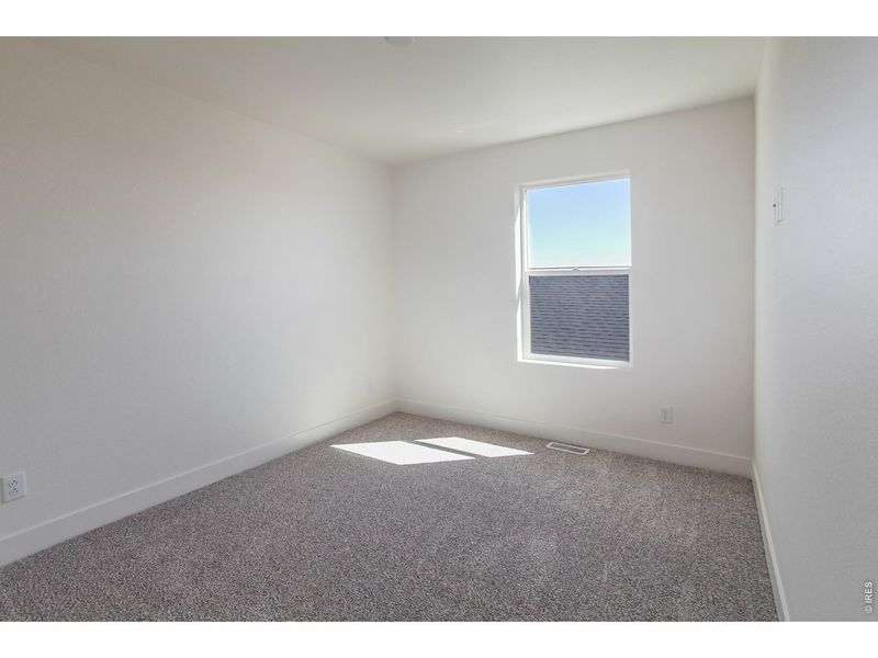Spacious, unfurnished interior of a new home in Prairie Song Story Collection - Single Family Homes, Windsor (Image 21).