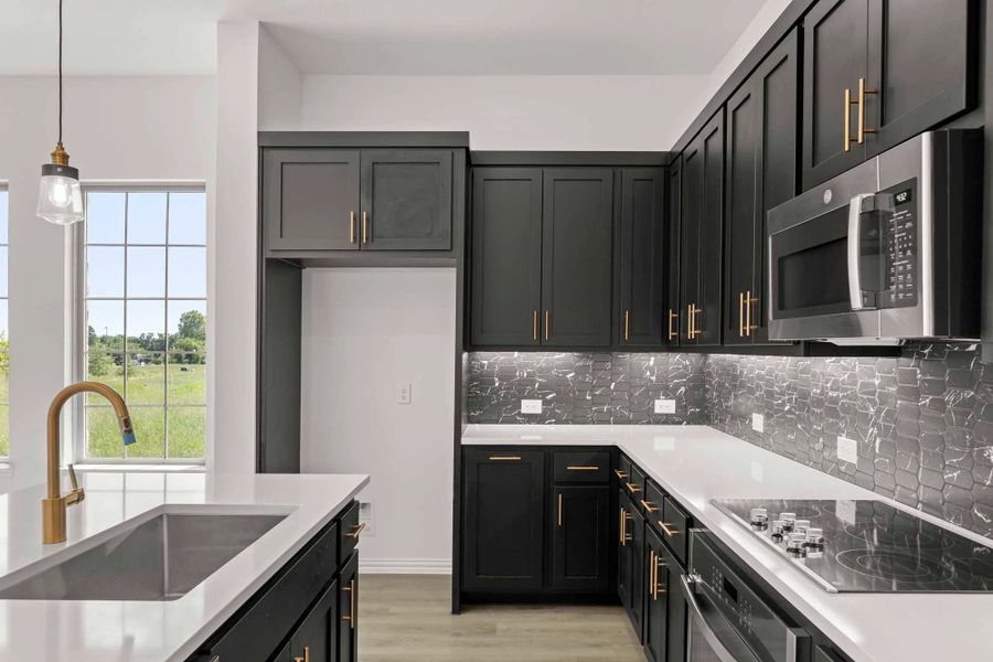 Kitchen featuring the Noir Collection Kitchen featuring the Noir Collection