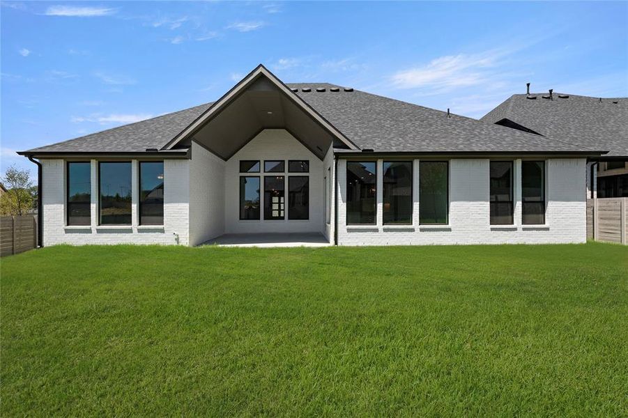Front exterior of a new home in Painted Tree Woodlands, McKinney, TX, highlighting curb appeal (Image 2).