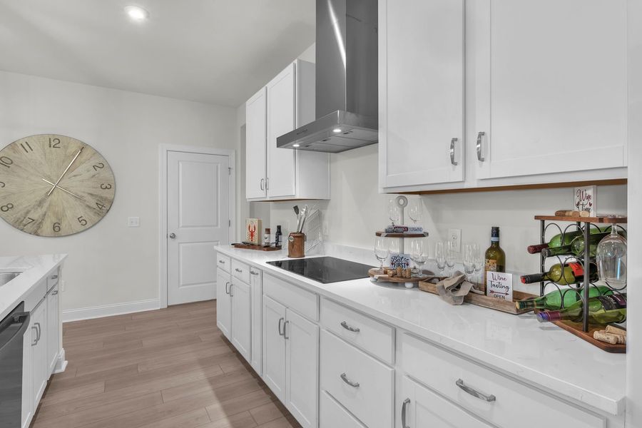 Furnished interior view inside a new home in The Beacon at Old Peachtree Single Family Homes, Lawrenceville (Image 301).