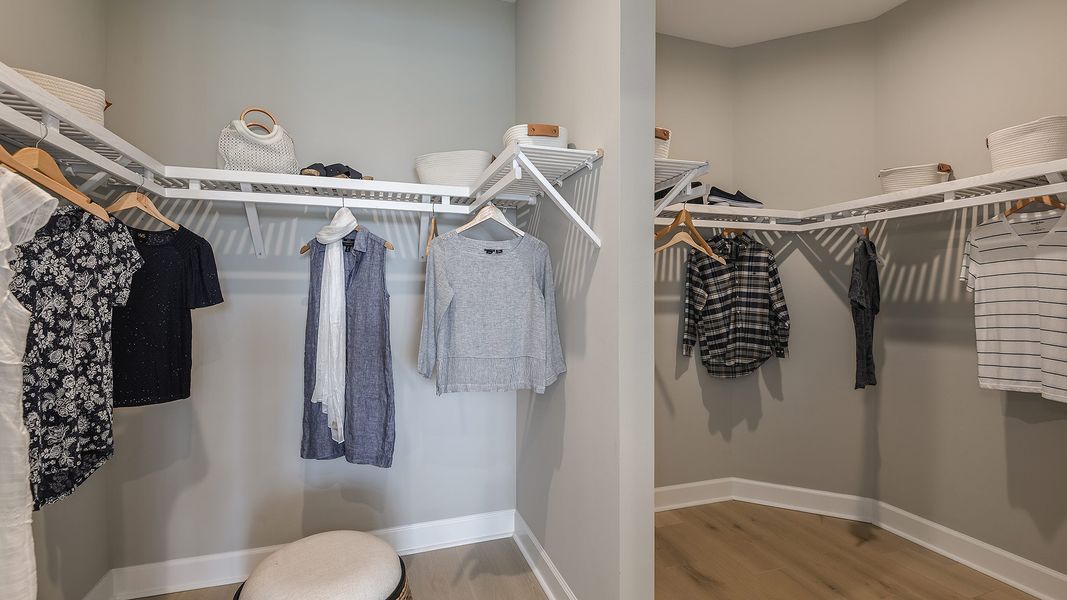 Furnished interior view inside a new home in Esplanade by the Islands, Naples (Image 15).