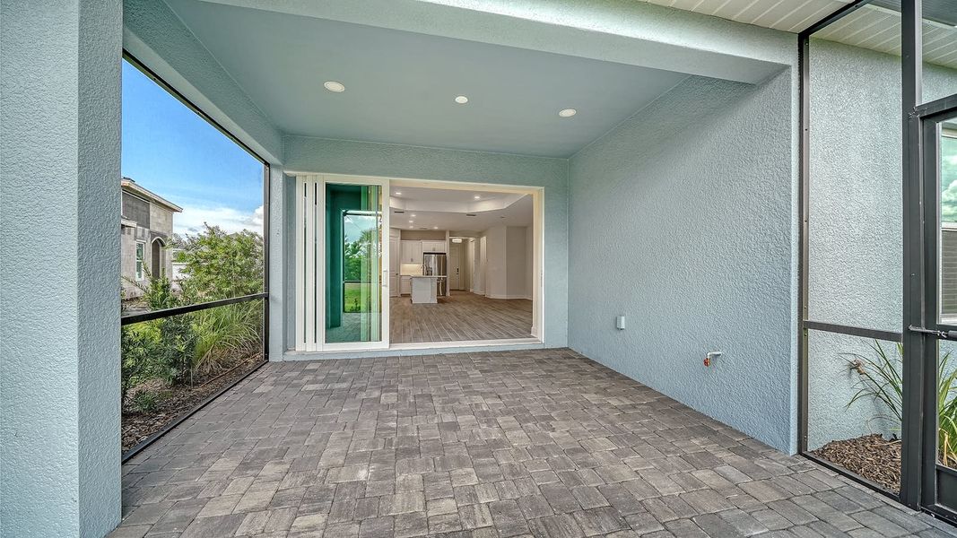 Exterior details and patio area of a home in Palm Grove Real Estate and Homes for Sale in Lakewood Ranch, FL - Neal Communities, Lakewood Ranch (Image 23). Exterior details and patio area of a home in Palm Grove Real Estate and Homes for Sale in Lakewood Ranch, FL - Neal Communities, Lakewood Ranch (Image 23).