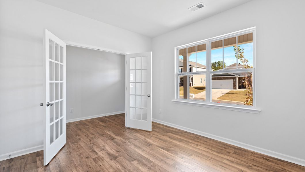 Spacious, unfurnished interior of a new home in Durbin Meadows Traditions, Fountain Inn (Image 17).