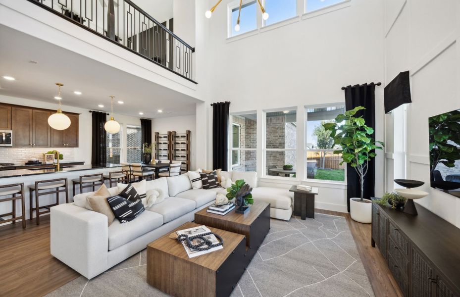 Spacious gathering room with two-story ceiling