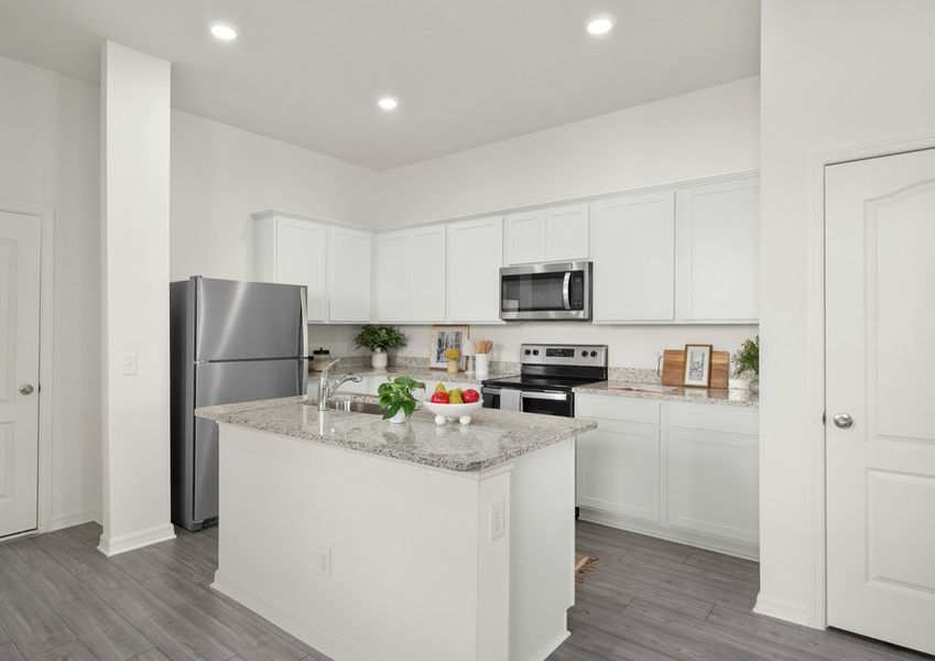 The spacious kitchen is perfect for preparing your family's favorite meals and treats.