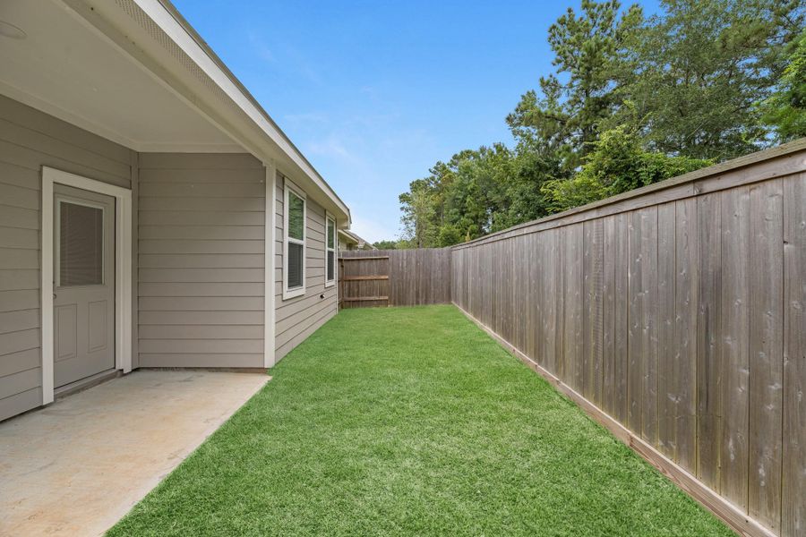 This backyard is perfect for family gatherings, social events, or simply unwinding in the fresh air.