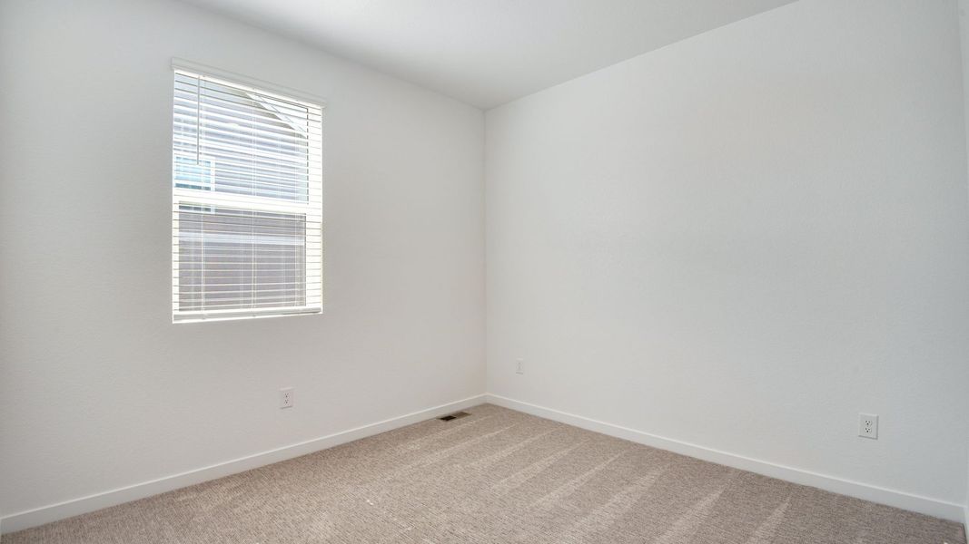 Representative unfurnished interior of a home built from the Harmony by D.R. Horton in Sky Ranch, Watkins (Image 21).