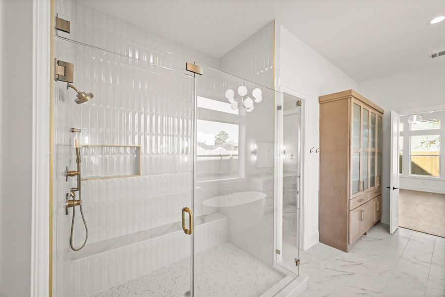 The linen cabinet provides tons of extra storage!