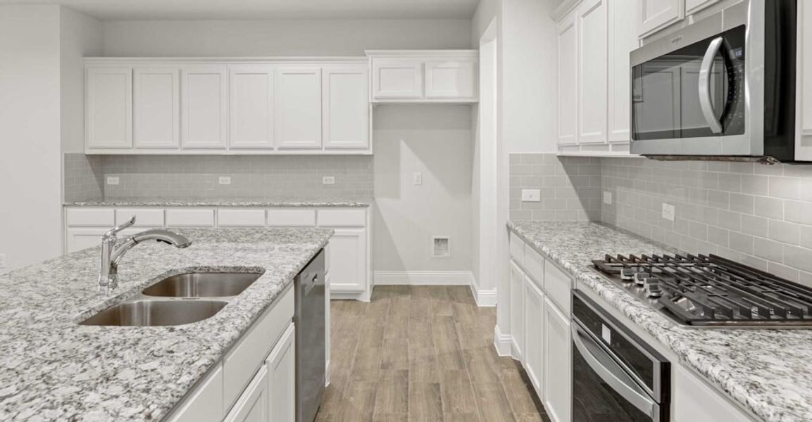 Representative exterior photo of a completed home built from the Thornbury by Impression Homes in Still Water Lake, Godley, TX (Image 9). Representative exterior photo of a completed home built from the Thornbury by Impression Homes in Still Water Lake, Godley, TX (Image 9).