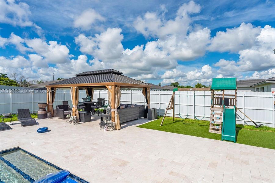Front exterior of a new home in , Homestead, FL, highlighting curb appeal (Image 20). Front exterior of a new home in , Homestead, FL, highlighting curb appeal (Image 20).