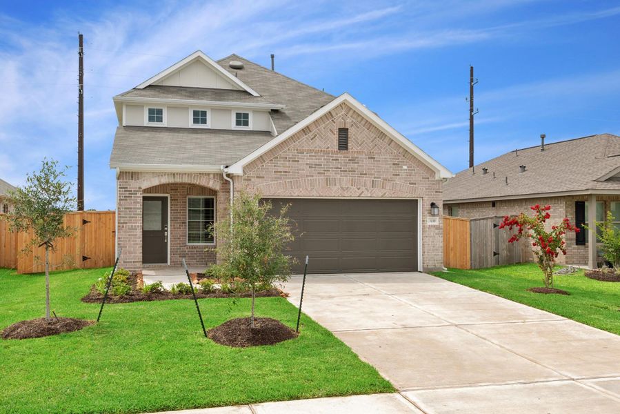 Front exterior of a new home in Miller's Pond, Rosenberg, TX, highlighting curb appeal (Image 15).