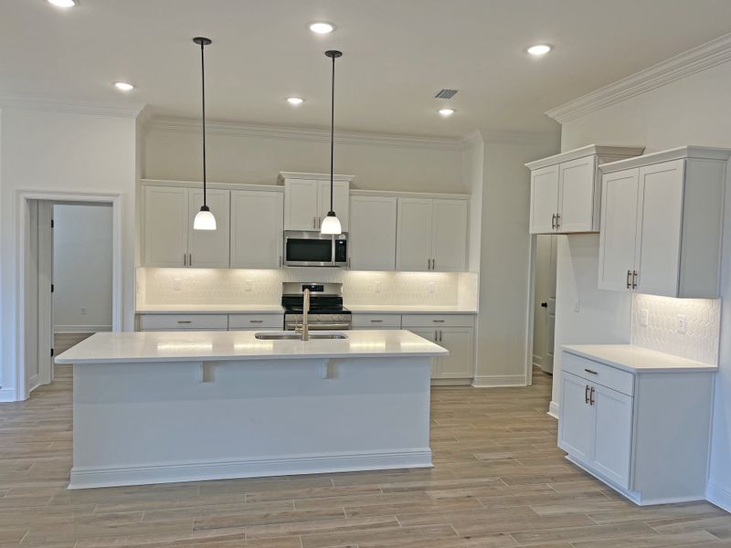 Furnished interior view inside a new home in Bird Song at Hammock Bay, Freeport (Image 7).