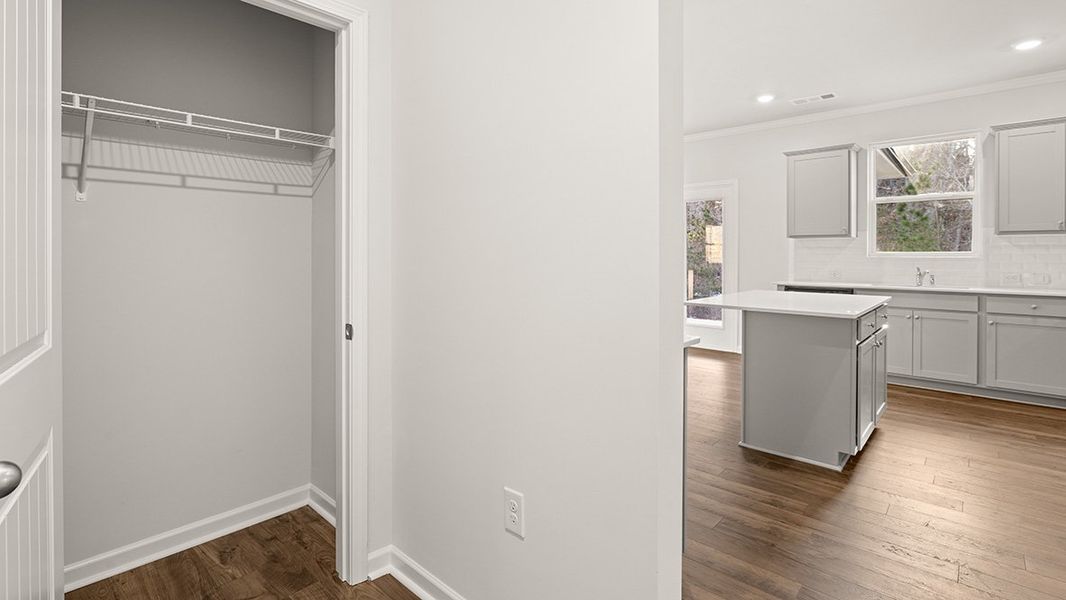 Representative unfurnished interior of a home built from the Mansfield by D.R. Horton in Liberty Crossing, Braselton (Image 19).